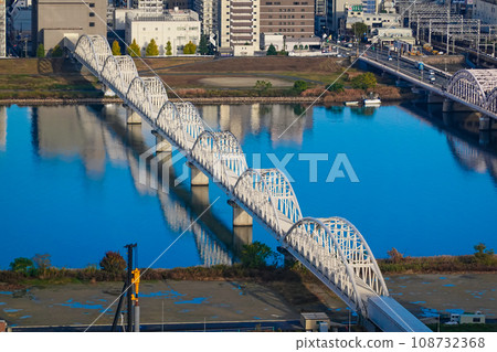 Bridge and iron bridge spanning the Yodo River from Umeda Sky Building (Umeda, Osaka City) Bridge and iron bridge spanning the Yodo River from Umeda Sky Building (Umeda, Osaka City) 108732368