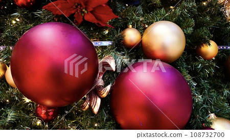 Enlarged photo of a Christmas tree with lots of ornaments Enlarged photo of a Christmas tree with lots of ornaments 108732700