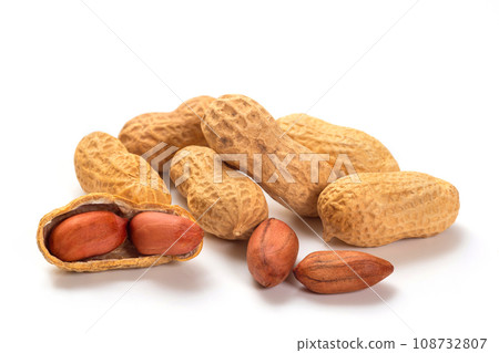 Peanuts isolated on white background, macro photography. Whole nuts and shelled kernels Peanuts isolated on white background, macro photography. Whole nuts and shelled kernels 108732807