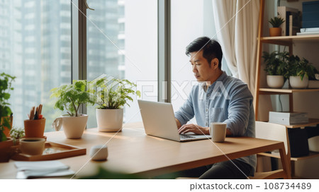 Asian male office worker doing telework 108734489