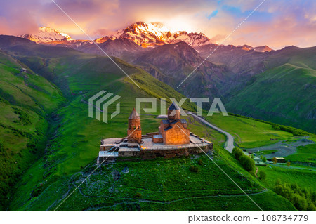 Aerial view of Gergeti trinity church at sunrise in Georgia. 108734779