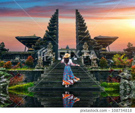 Women tourists standing at Besakih temple in Bali, Indonesia. 108734818