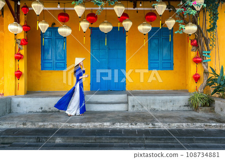 Asian woman wearing vietnam culture traditional at Hoi an, Vietnam. 108734881