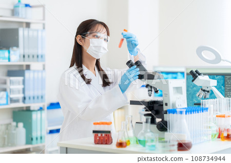 Young female researcher doing experiments in the laboratory 108734944
