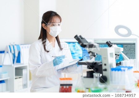 Young female researcher doing experiments in the laboratory 108734957