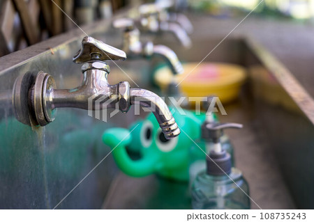 I'm curious about the green elephant in the hand washing area. I'm curious about the green elephant in the hand washing area. 108735243