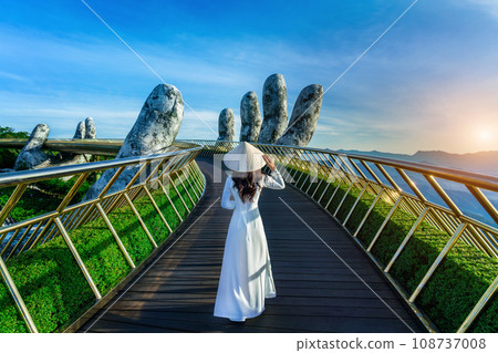 Tourist walking at Golden Bridge in Danang Vietnam. Tourist walking at Golden Bridge in Danang Vietnam. 108737008