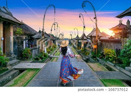 Tourist walking at Penglipuran village is a traditional oldest Bali village in Bali, Indonesia. 108737012