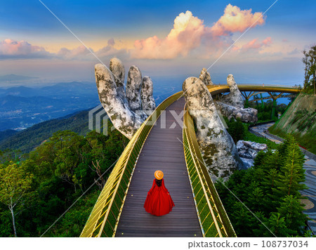 Tourist walking at Golden Bridge in Danang Vietnam. 108737034
