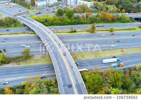 Fast moving heavy traffic on NJ Turnpike I-95 american freeway Fast moving heavy traffic on NJ Turnpike I-95 american freeway 108738682