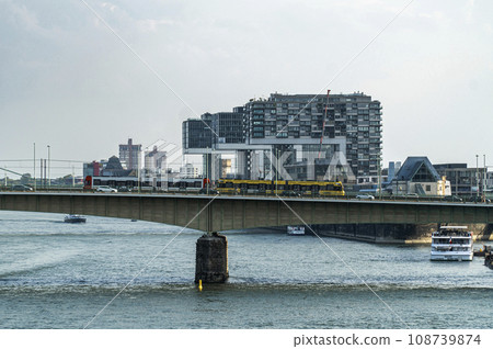 View of the Rhine River, Deutz Bridge and the Kranhaus office center, Cologne Germany View of the Rhine River, Deutz Bridge and the Kranhaus office center, Cologne Germany 108739874