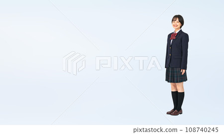 Female student in uniform, cropped full-body photo Female student in uniform, cropped full-body photo 108740245