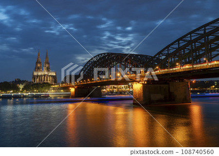 Cologne Cathedral and Hohenzollern Bridge in the evening Cologne Cathedral and Hohenzollern Bridge in the evening 108740560