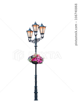 vintage street lamp with petunia flowers isolated on white 108740868