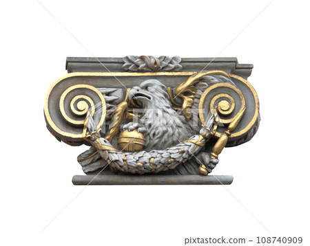 fragment of medieval stone house decoration covered with gold isolated on white background 108740909