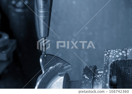 The 5 axis machining center cutting the boat propeller parts parts with taper ball end mill tool. The 5 axis machining center cutting the boat propeller parts parts with taper ball end mill tool. 108742360