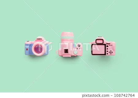 Colorful toy camera on pastel color background Colorful toy camera on pastel color background 108742764
