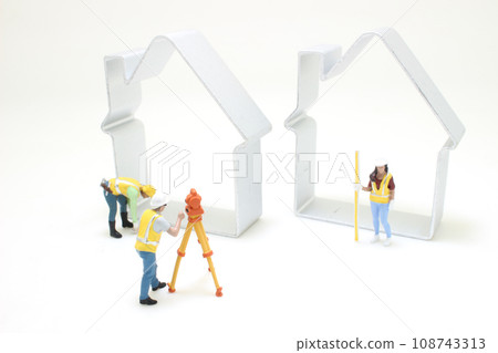 a Land surveyor on construction site with figure 108743313