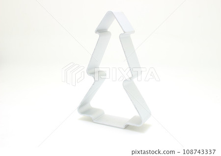 a Christmas tree cookie cutter on white background 108743337