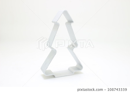 a Christmas tree cookie cutter on white background 108743339