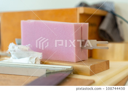 Foam for furniture upholstery in a workshop 108744430