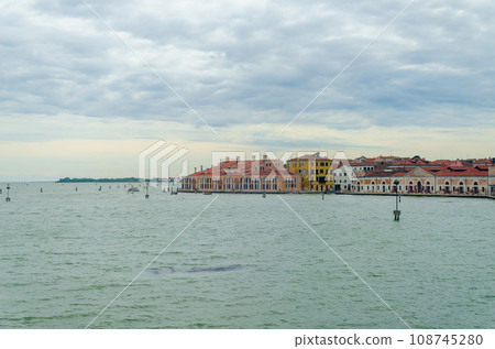 Part of a Venetian cityscape with a part of the blue Adriatic sea 108745280
