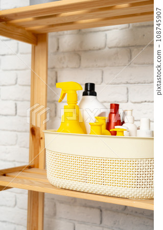 Liquid detergents containers on shelf in a bathroom 108745907