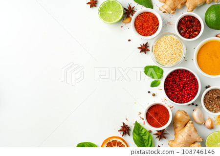 Beautiful composition with various spices on white background Beautiful composition with various spices on white background 108746146