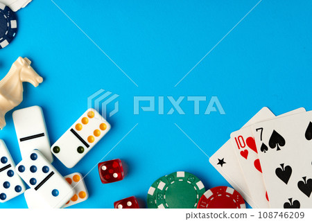 Playing cards, chips and dice on blue backgorund 108746209