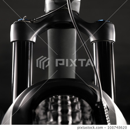 Mountain Bike Suspension Fork on Dark Background, Studio Shot 108748620