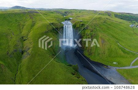 Aerial view on the Skogafoss waterfall, Iceland. Famous place. Aerial view on the Skogafoss waterfall, Iceland. Famous place. 108748628