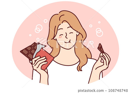 Smiling girl eating chocolate bar 108748748