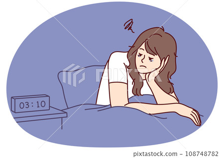Exhausted woman sit in bed suffer from insomnia 108748782