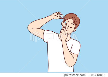 Man drips moisturizing liquid into eyes to improve vision or avoid drying out of retina 108748818