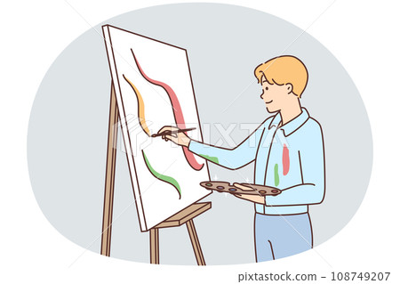 Young man drawing on easel 108749207