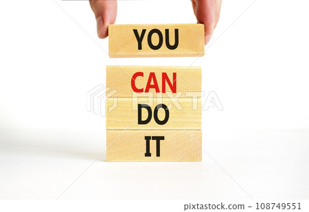 You can do it symbol. Concept word You can do it on beautiful wooden block. Beautiful white table white background. Businessman hand. Business motivational you can do it concept. Copy space. You can do it symbol. Concept word You can do it on beautiful wooden block. Beautiful white table white background. Businessman hand. Business motivational you can do it concept. Copy space. 108749551
