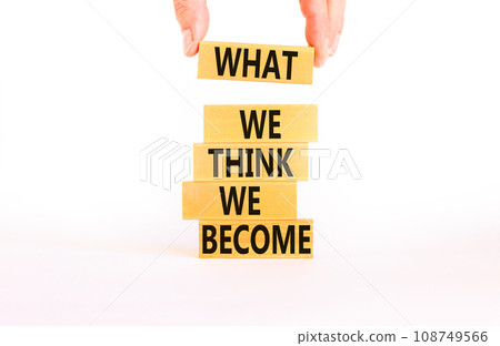 We become or think symbol. Concept word What we think We become on wooden block. Beautiful white table white background. Businessman hand. Business we become or think concept. Copy space. We become or think symbol. Concept word What we think We become on wooden block. Beautiful white table white background. Businessman hand. Business we become or think concept. Copy space. 108749566