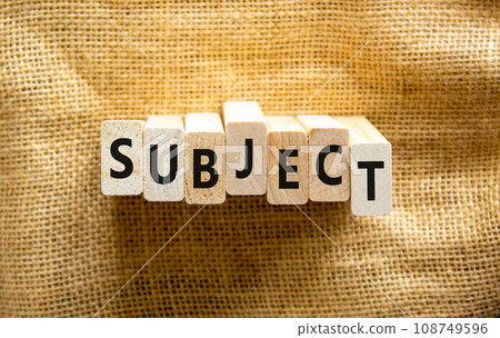 Subject symbol. The concept word Subject on wooden blocks. Beautiful canvas background, copy space. Business and subject concept. Subject symbol. The concept word Subject on wooden blocks. Beautiful canvas background, copy space. Business and subject concept. 108749596