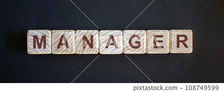 concept word manager on cubes on a beautiful dark background 108749599