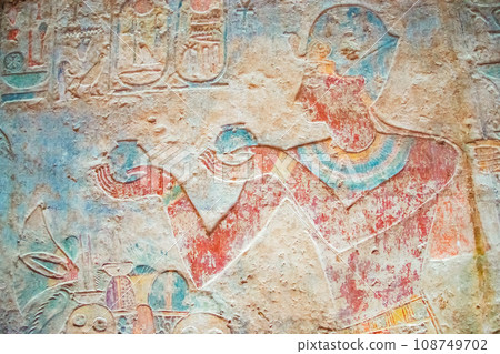 Colorful Egyptian hieroglyphs as an ancient background. 108749702