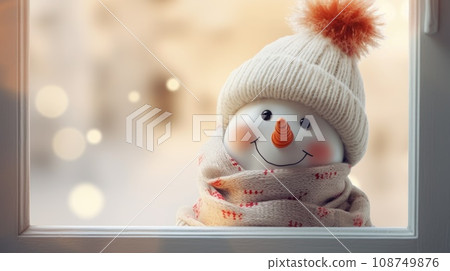 Cute snowman with scarf and hat outside the window. Winter holiday christmas greeting card concept Cute snowman with scarf and hat outside the window. Winter holiday christmas greeting card concept 108749876