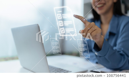 Document management concept, Businesswomen check electronic document on digital document Document management concept, Businesswomen check electronic document on digital document 108756441