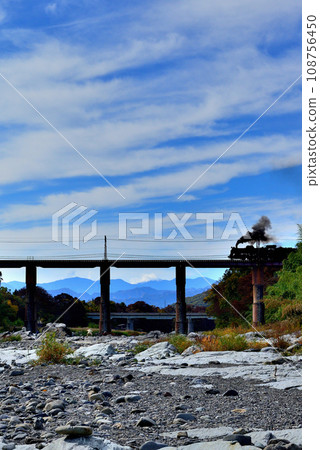 Chichibu Railway Arakawa Bridge and SL Paleo Express scenery 108756450