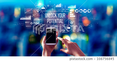 Unlock your potential theme with person using a smartphone at night 108756845