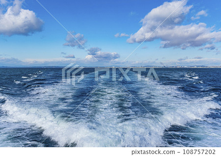 Wake, sun, waves, voyage 108757202