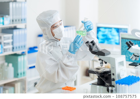 Young female researcher doing research and development in a clean room 108757575
