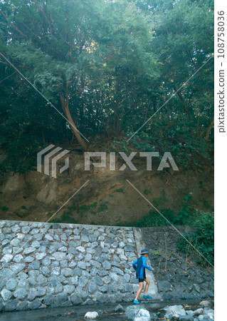 outing to the riverside, playing in a river, younger 108758036