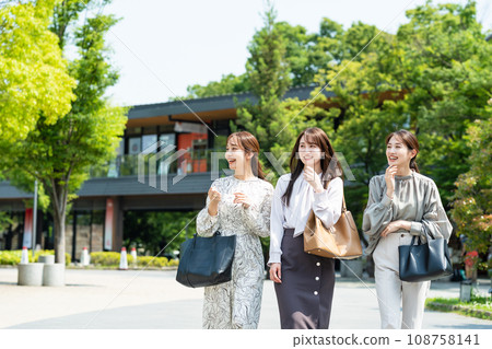businesswoman walking in office businesswoman walking in office 108758141