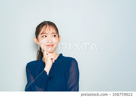 A woman thinking happily 108759022