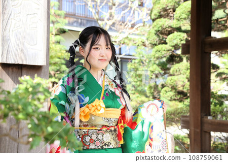 Adult furisode shoot, location shoot, cute hairstyle, Japanese woman in green kimono Adult furisode shoot, location shoot, cute hairstyle, Japanese woman in green kimono 108759061
